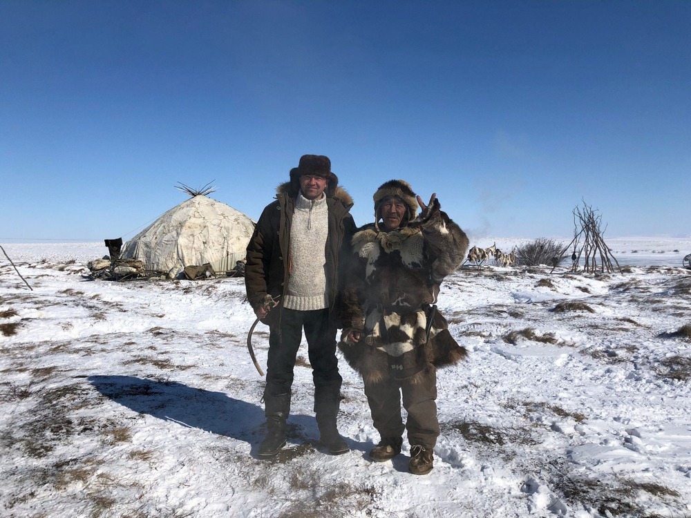 Chukotka sled dog lying down in bright light